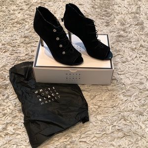 WHBM Peyton Black Heels Size 7.Suede with gold buttons.Stretch laces.Never worn.